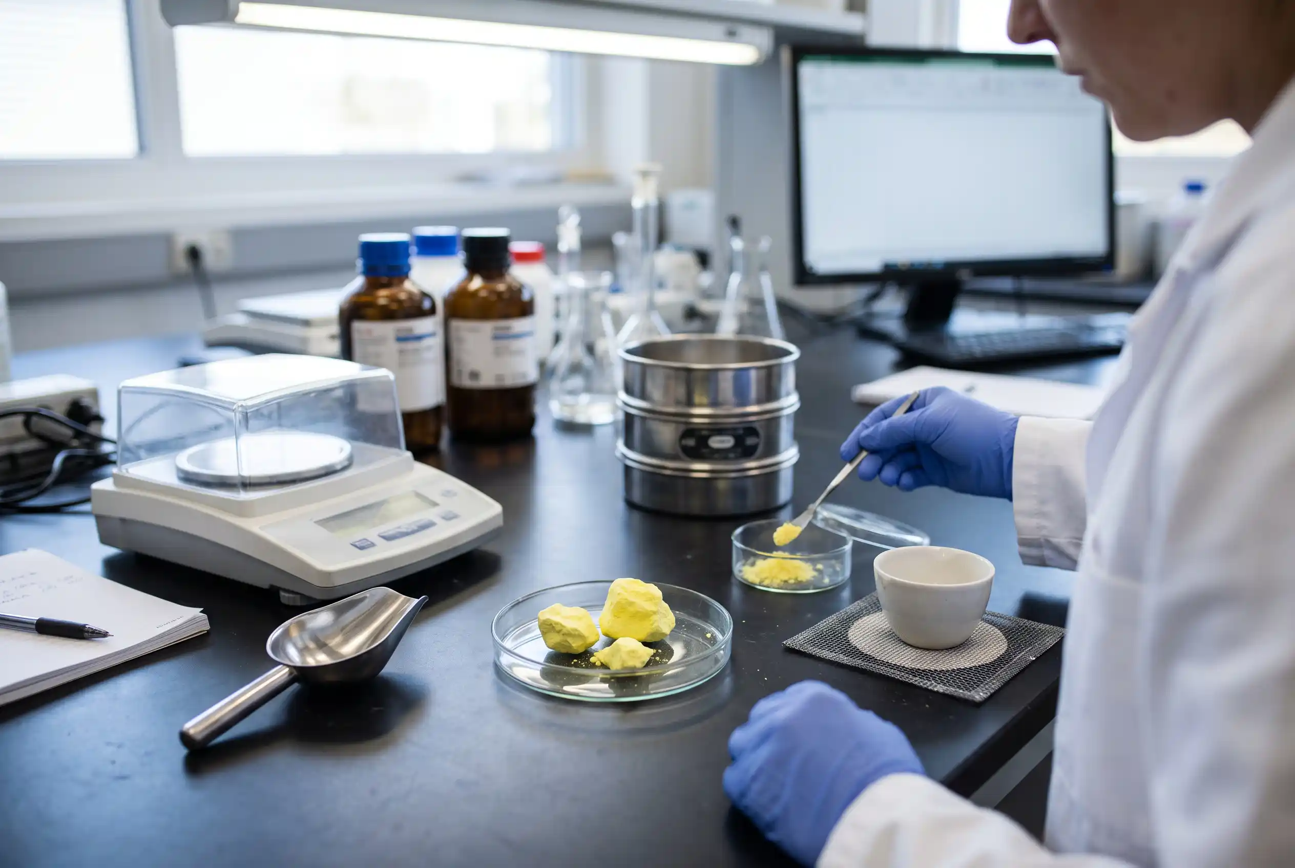 Sulfur quality review covering purity, moisture, ash, acidity and particle characteristics